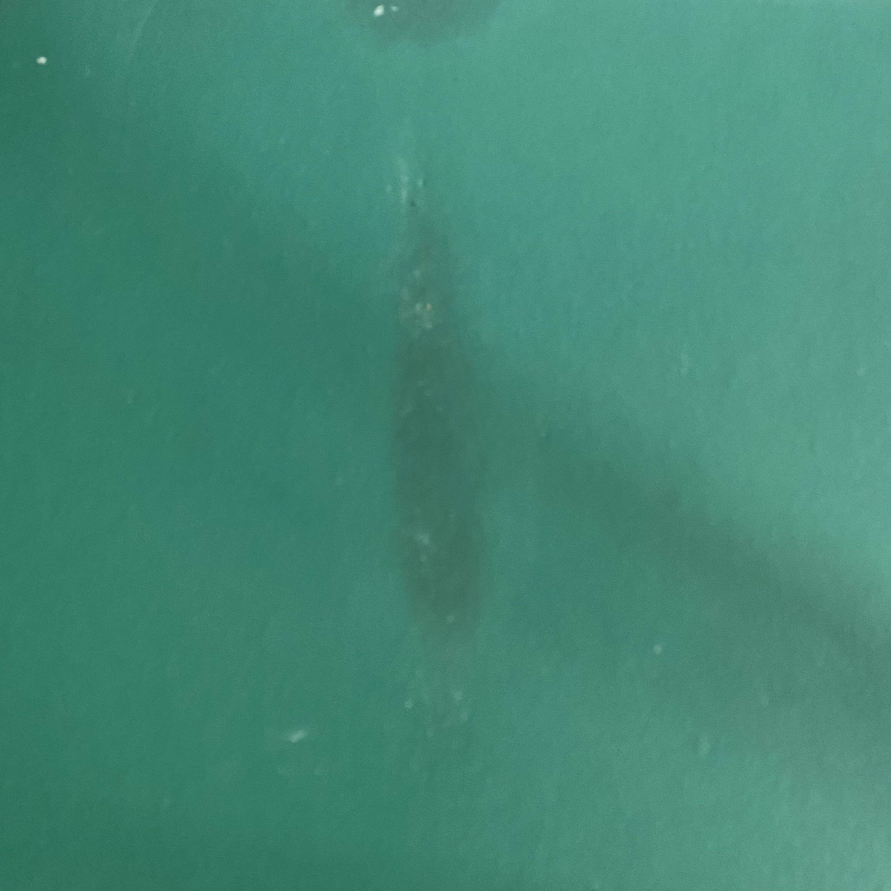 Pair of faux leather and chrome armchairs