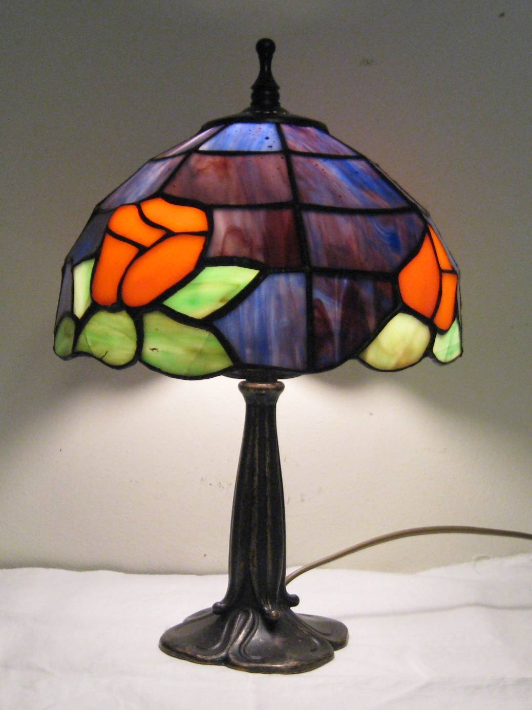 Pair of Art Nouveau Tiffany lamps with leaded glass, 1990.