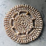 Trivet made of seashells