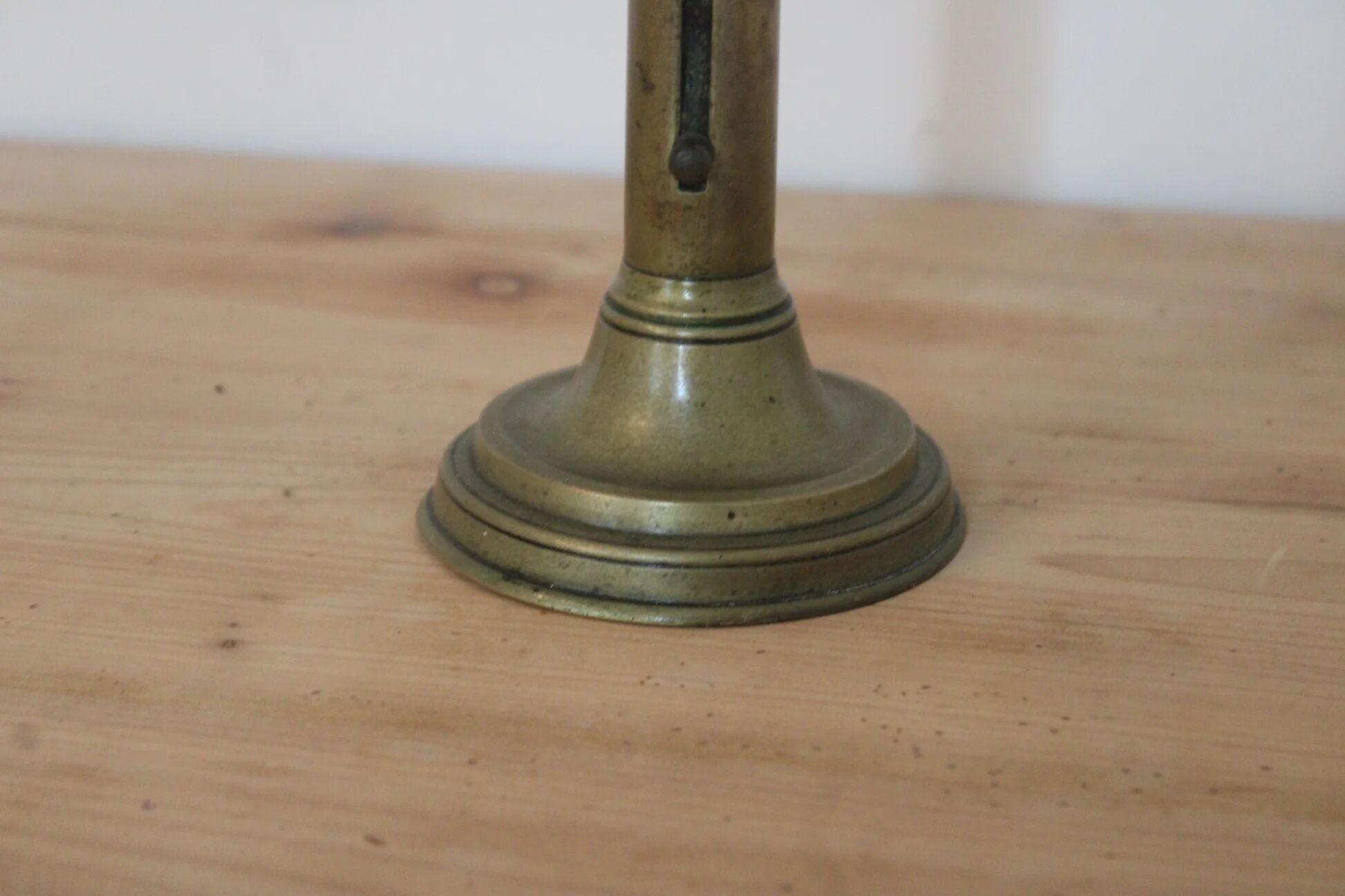 Antique brass push candle holder – vintage patinated candlestick H20 cm