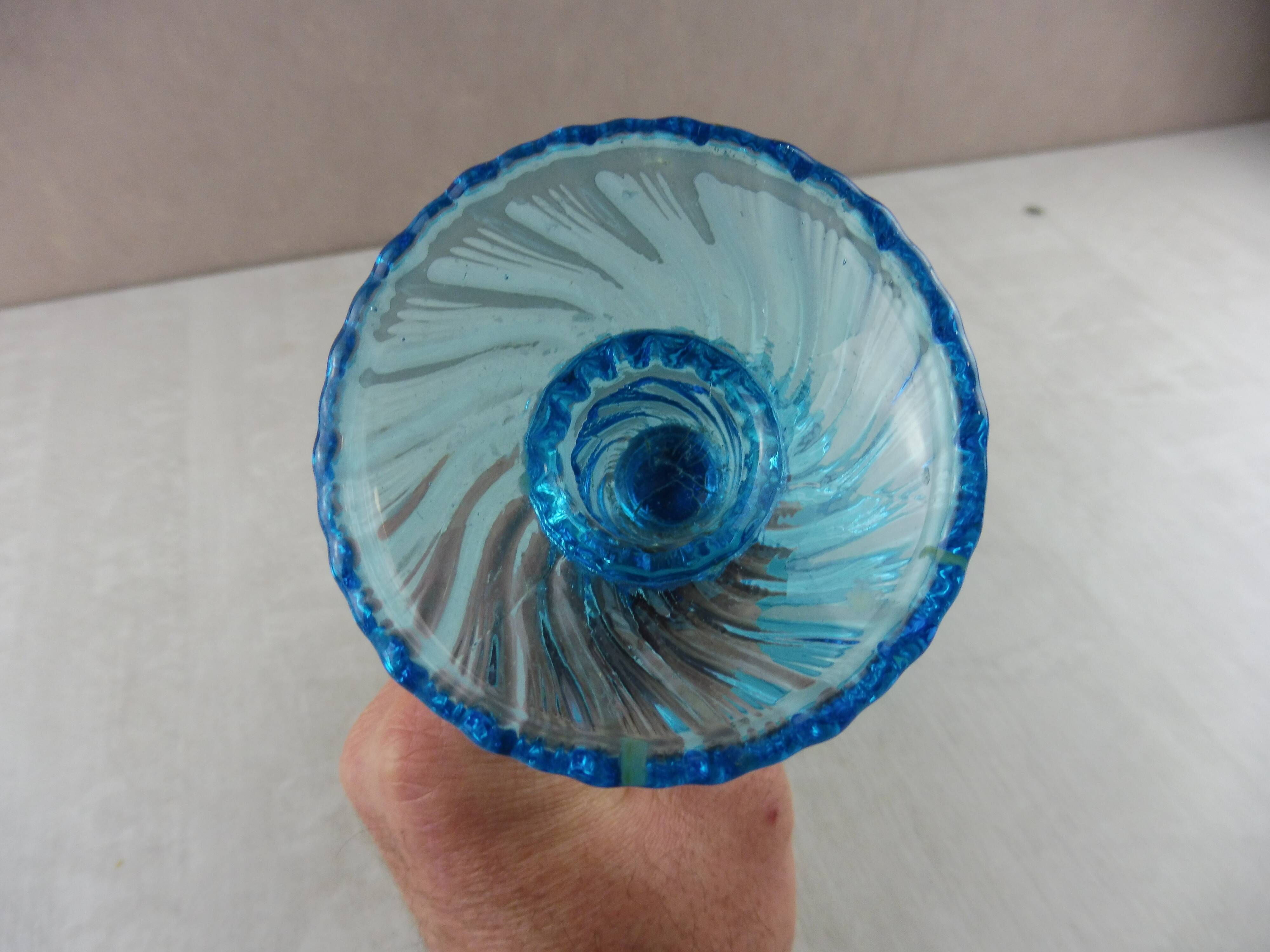 Old candlestick, blue molded glass