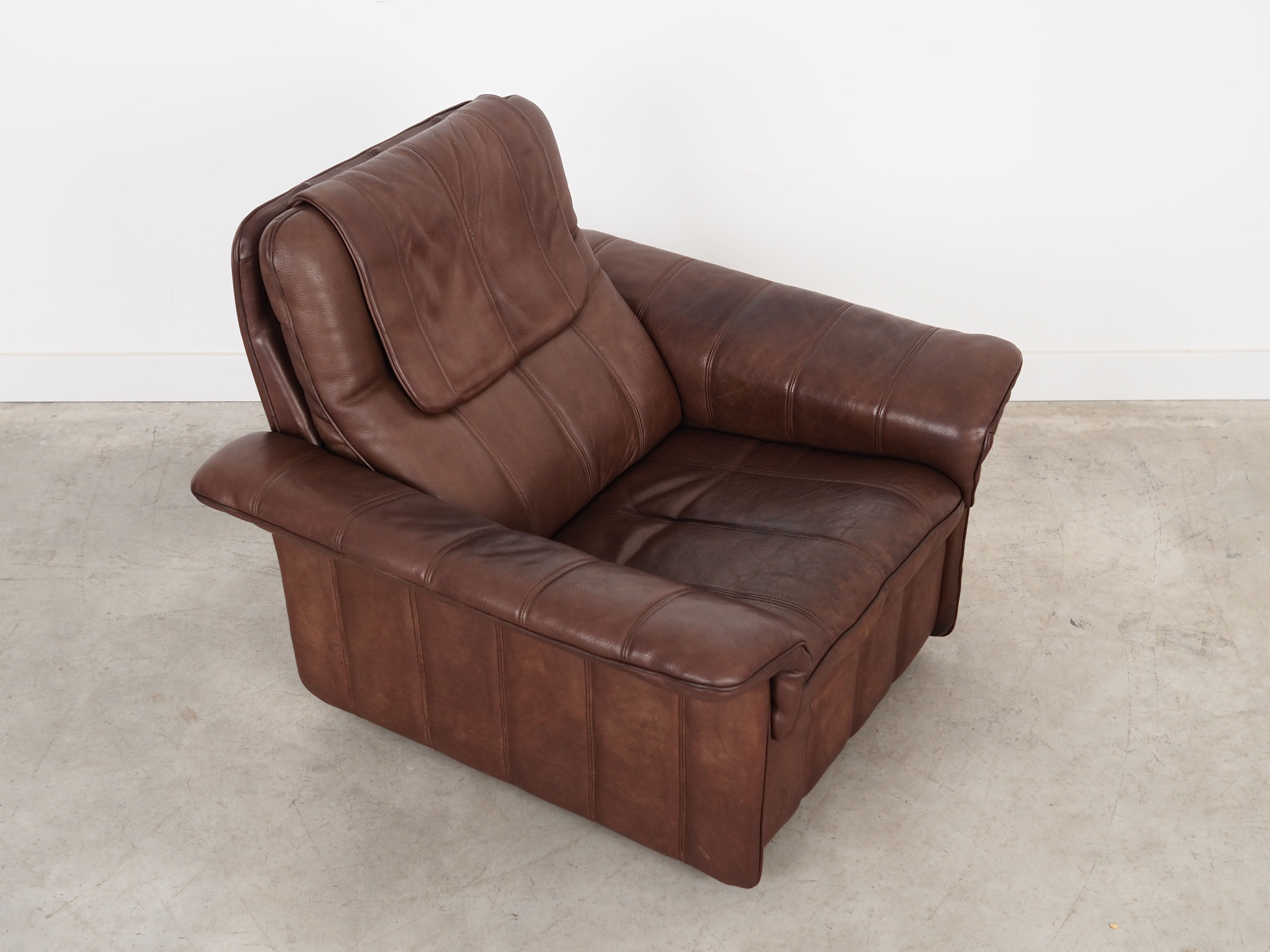 Fauteuil en cuir marron, design suisse, années 1970, fabrication: De Sede