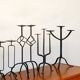 Pair of twisted tripod candlesticks in black iron, Brutalist, 1970 - 44 cm