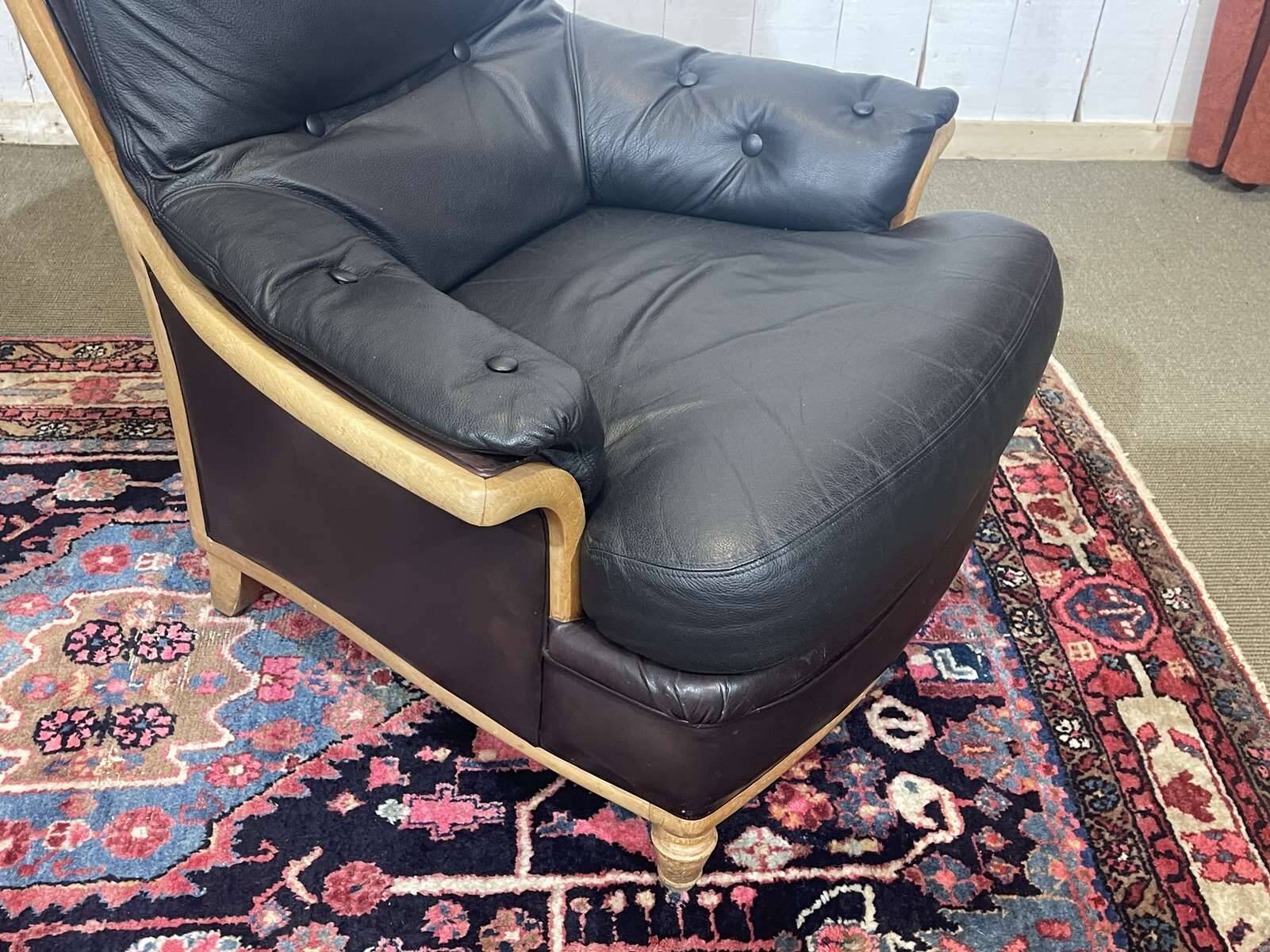Pair of leather and beech armchairs from the 1970s.