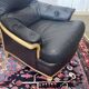 Pair of leather and beech armchairs from the 1970s.