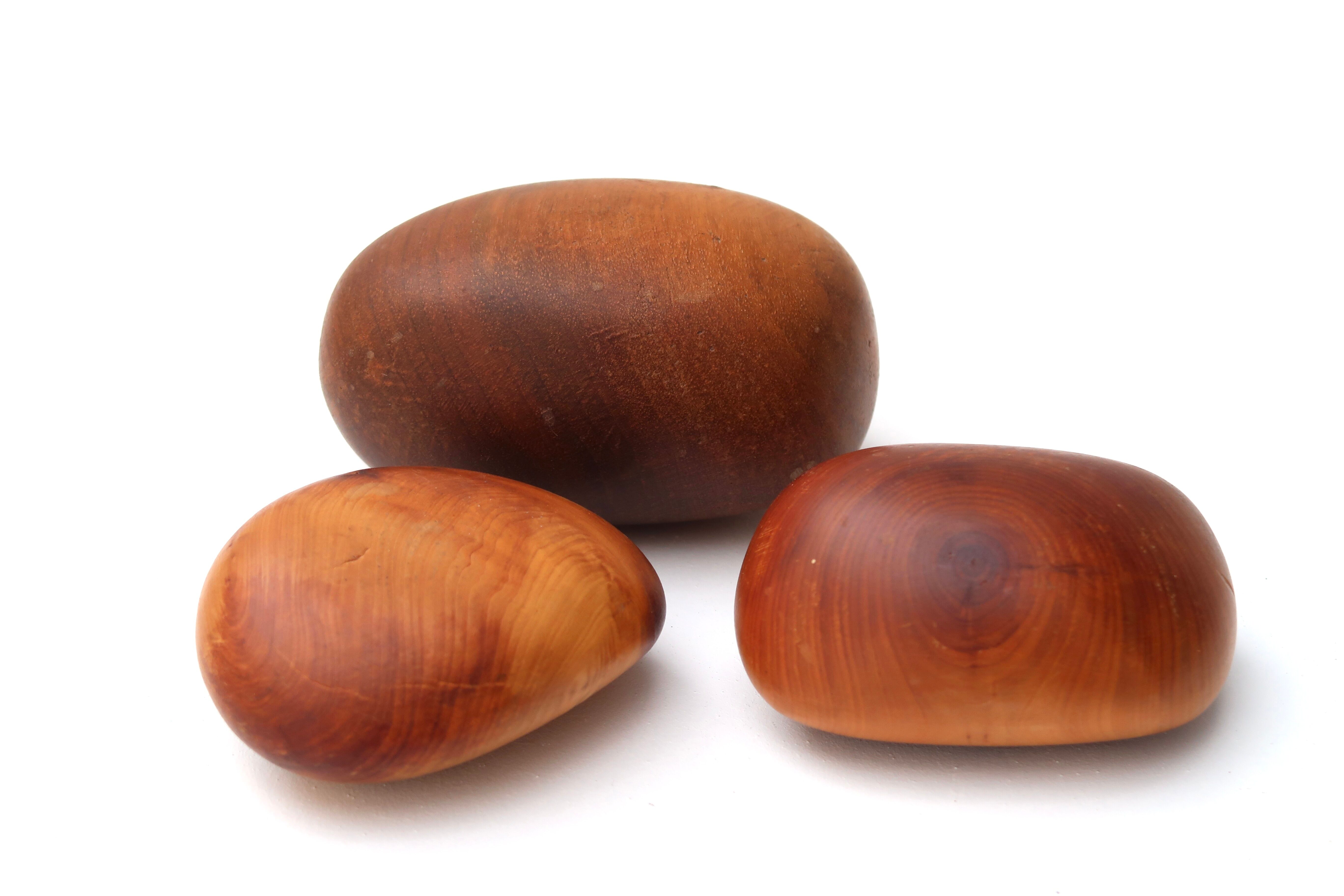 Set of three wooden paperweights 70s