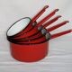 Red enamelled sheet metal pans