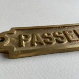 "Passengers" gold brass plate