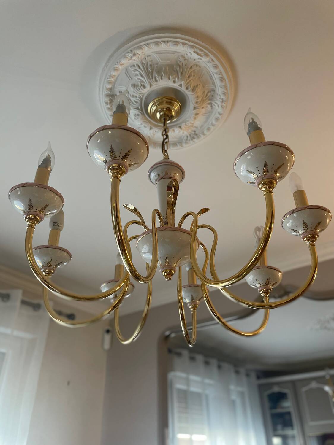 Two chandeliers and two porcelain wall lights, Italy