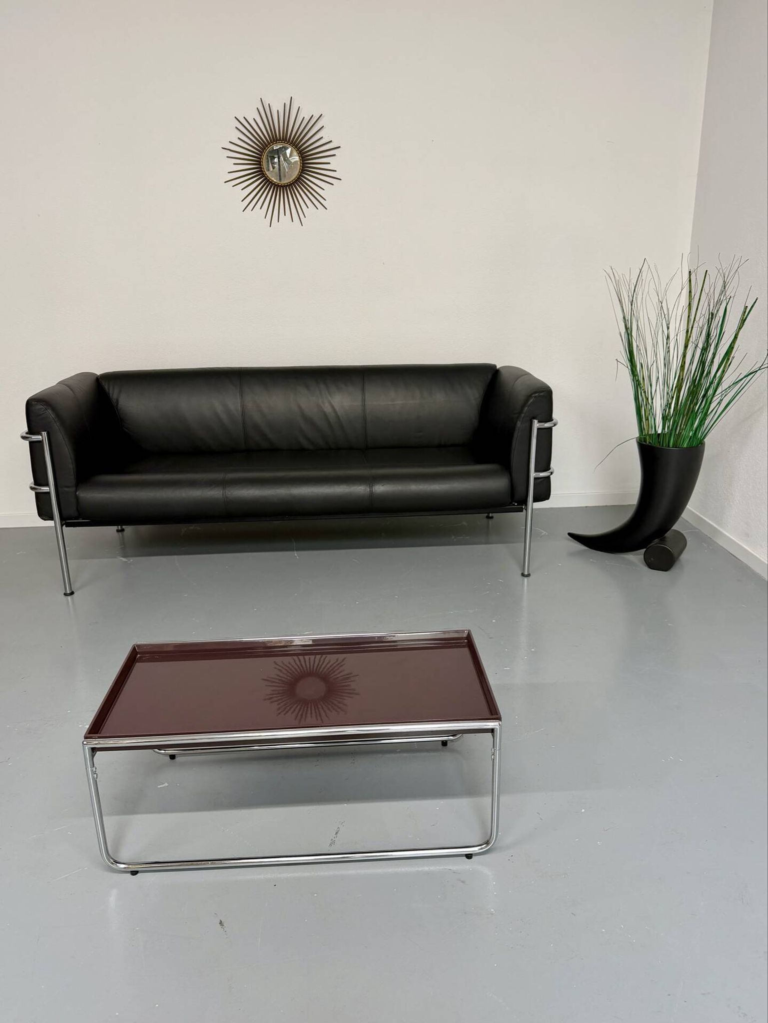 Three-seater tubular chrome and black leather sofa by Kébé, Denmark 80
