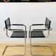 Pair of tubular armchairs in metal and leather Style Marcel Breuer