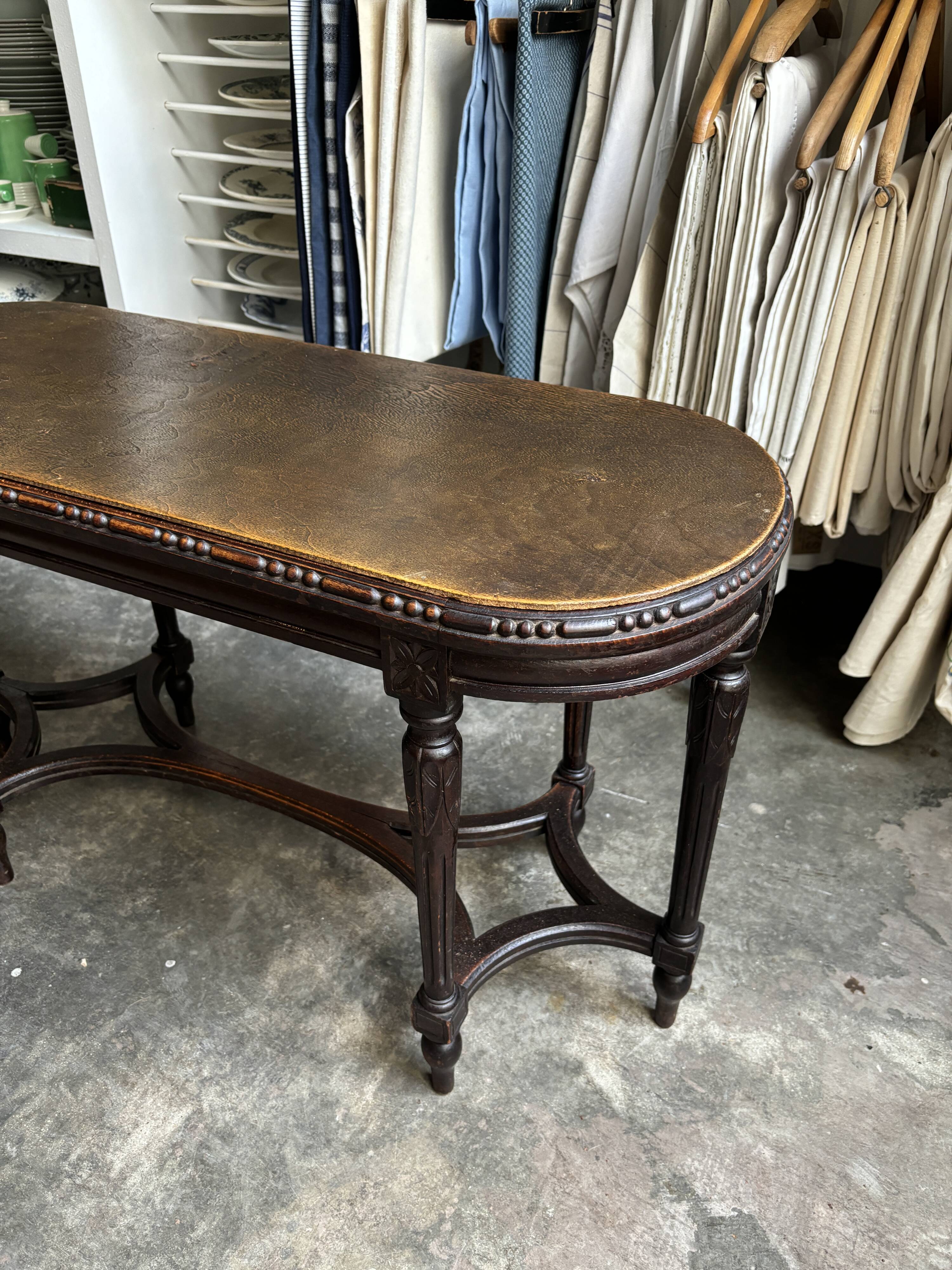 Dark wood piano bench