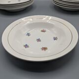12 hollow porcelain plates, floral decoration and golden ledé - ∅: 23cm