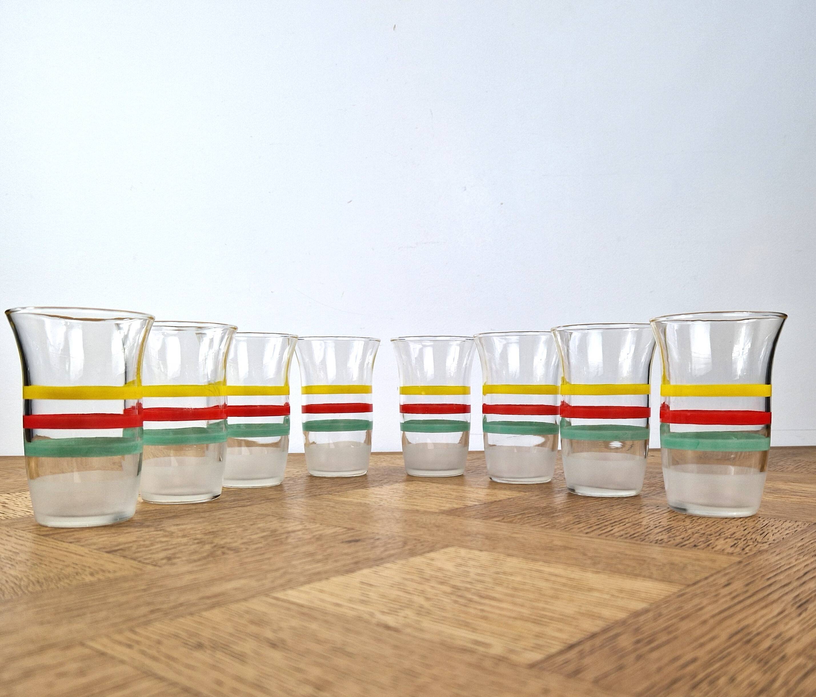 8 multicoloured vintage orangeade glasses from the 60s/70s.