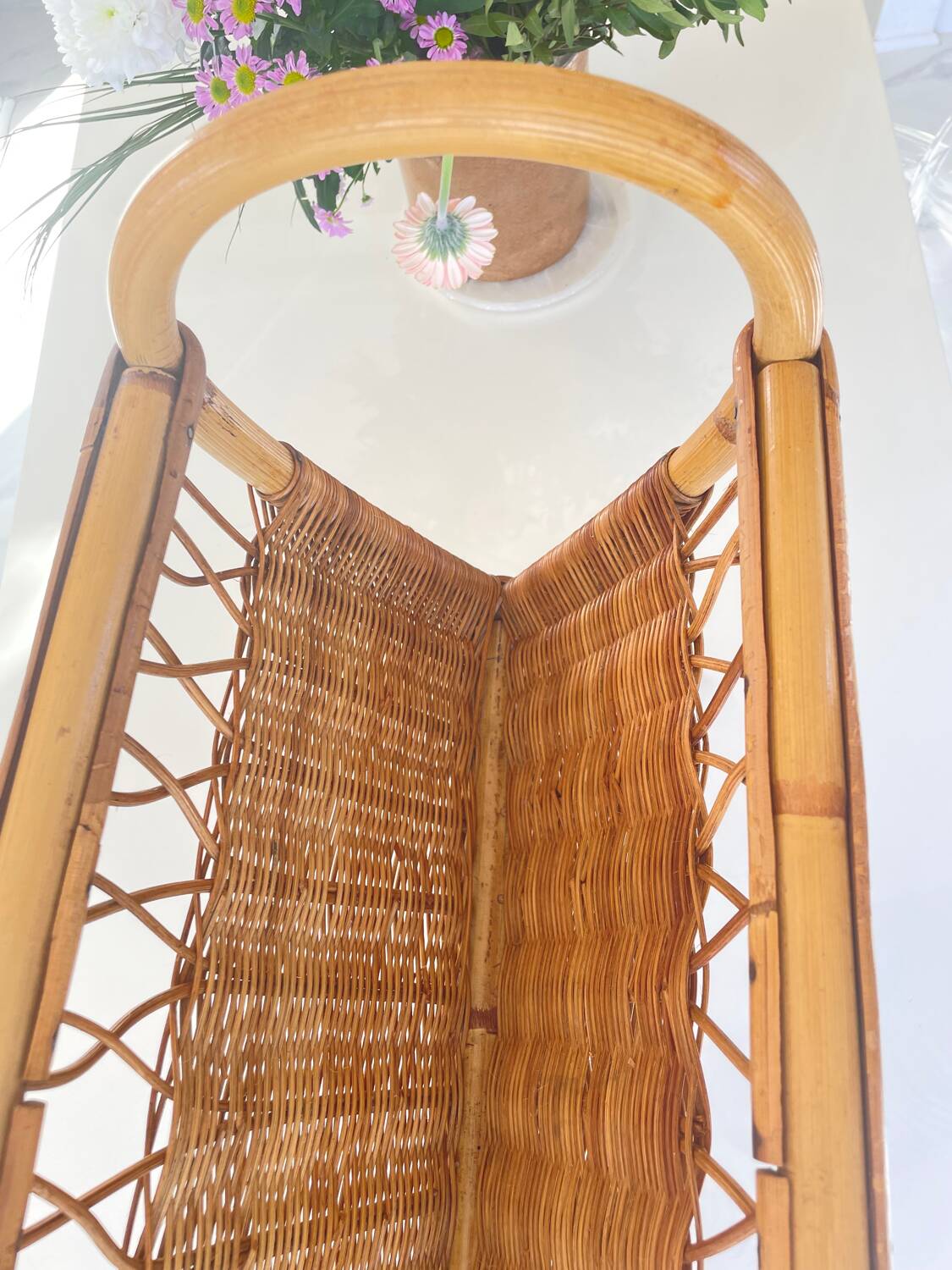 Old rattan magazine rack from the 70s