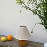 Wooden ball bedside lamp and beige lampshade