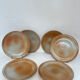 12 stoneware dinner plates, 1970