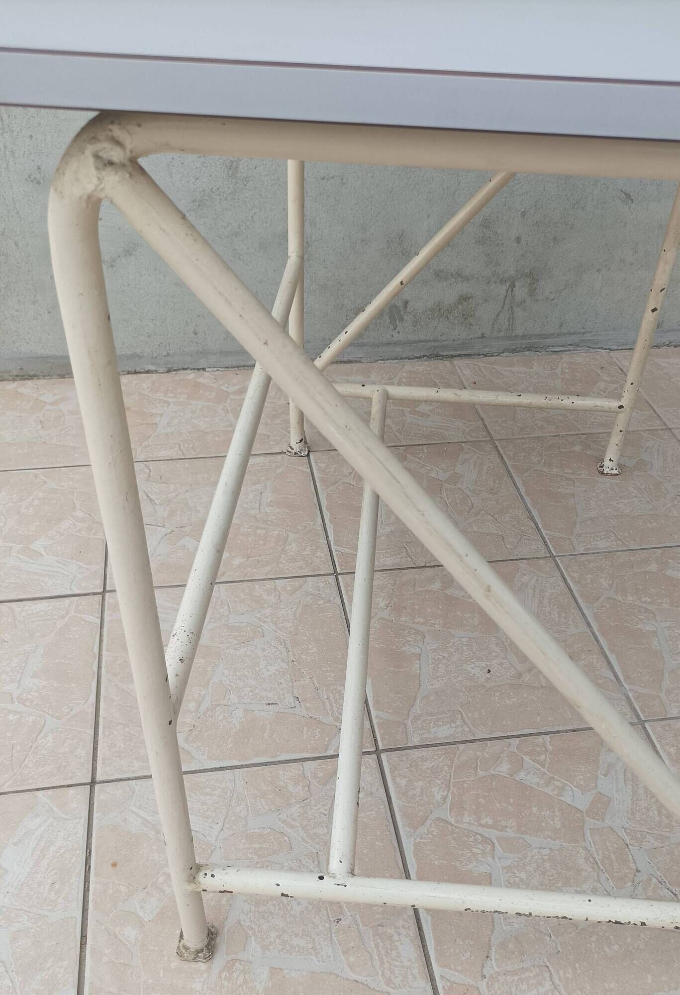 Industrial high table made of metal and formica.