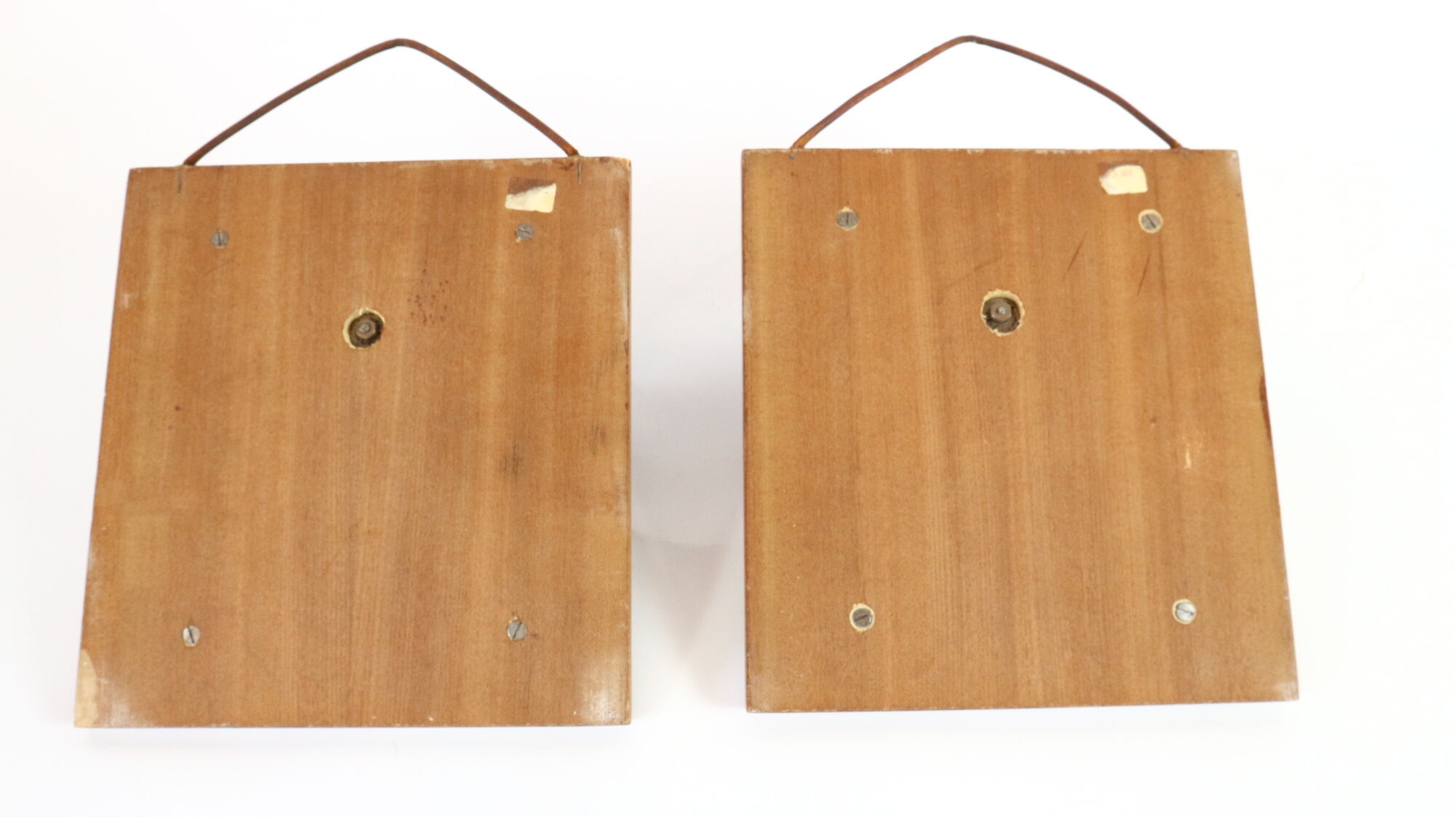Two coat hangers, wood, leather and black leather, 70s