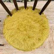 Pair of yellow moumoute chairs