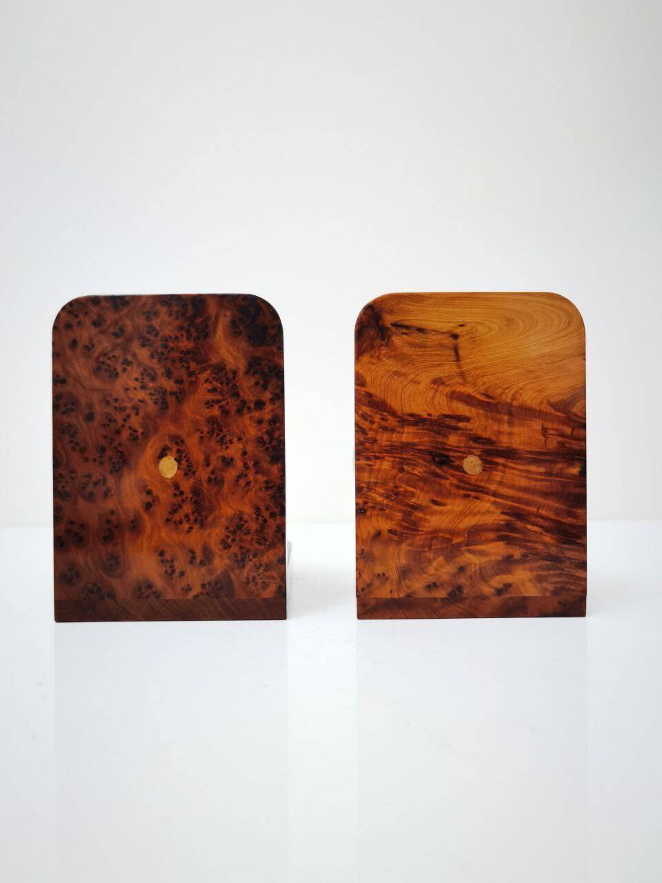 Art Deco bookends in polished solid burl wood