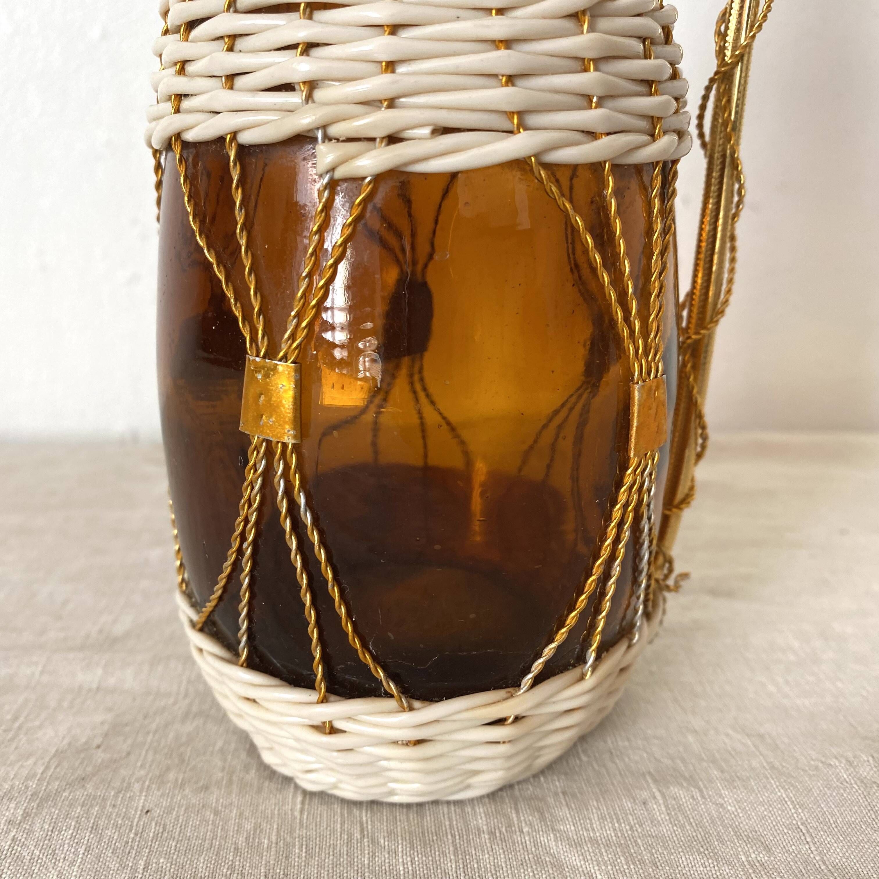 Amber glass bottle and scoubidou