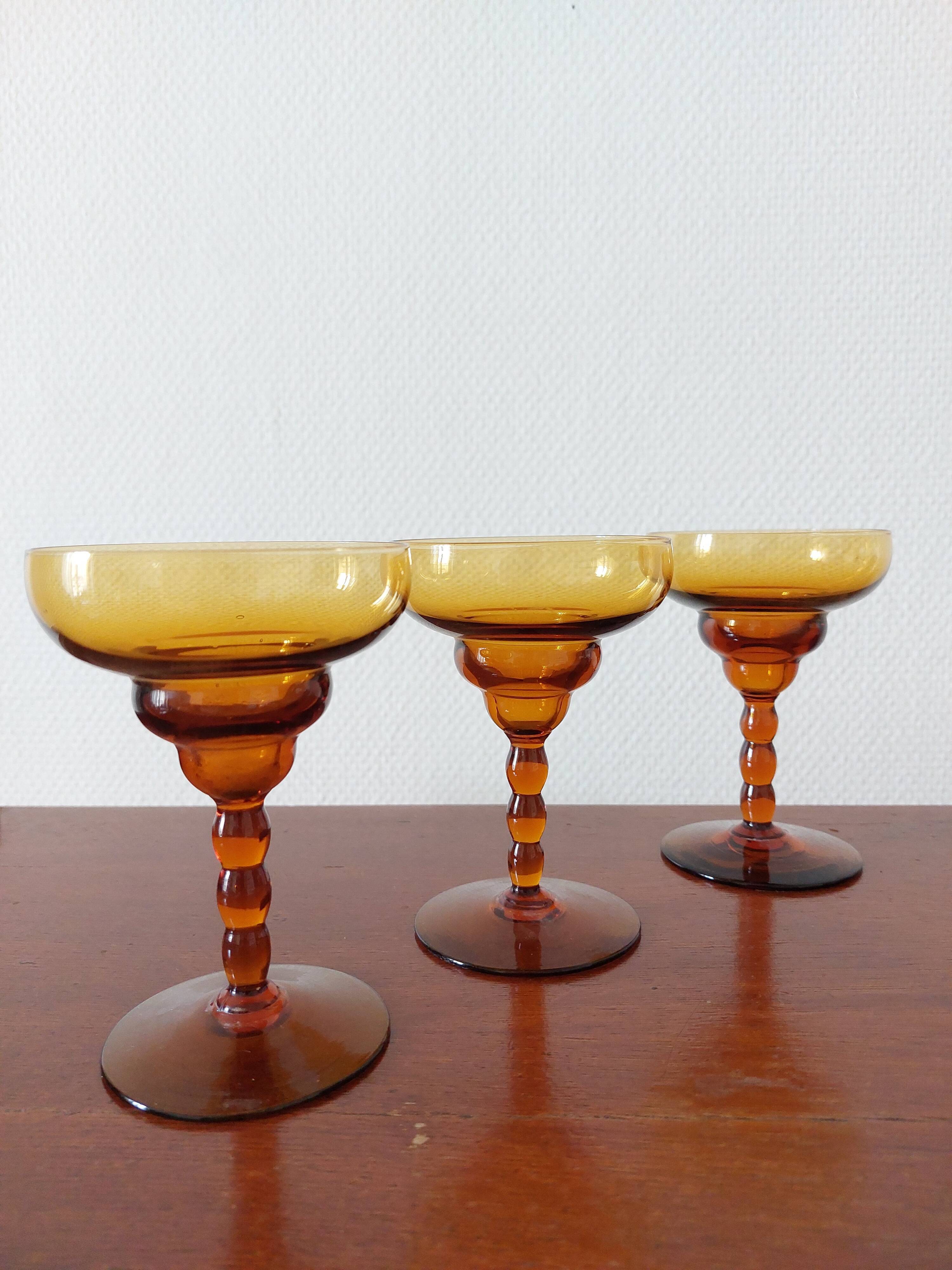 Set of 3 vintage amber foot glasses