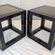 Chinese side tables in black lacquer, stone top.