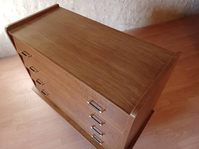 Vintage slanted commode with tapered legs from the 1960s in golden oak.