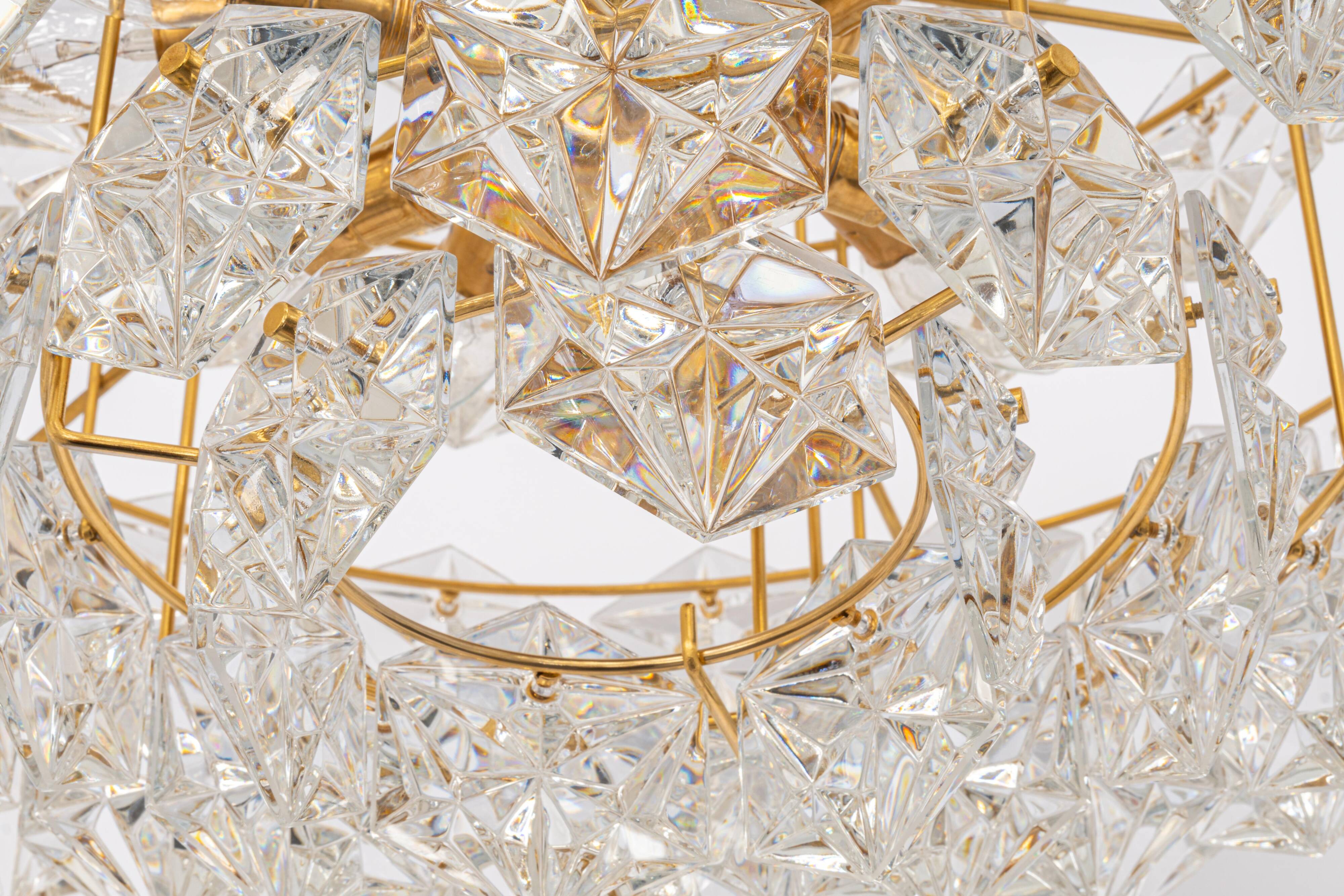 Chandelier, brass and crystal glass by Kinkeldey, Germany, 1970s.