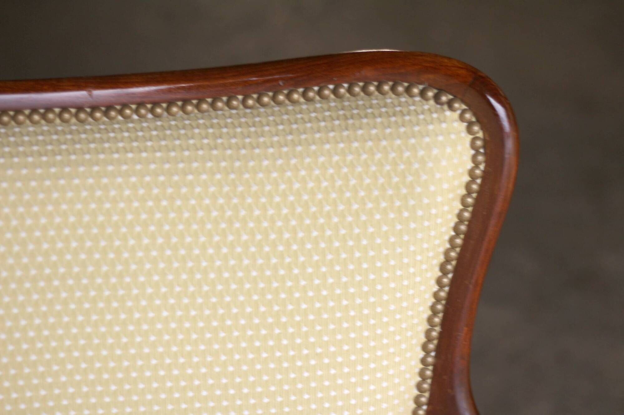 pair of mahogany and cane armchairs. English work (1960s).