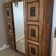 Armoire en bois art déco sculpture et moulures fleuries