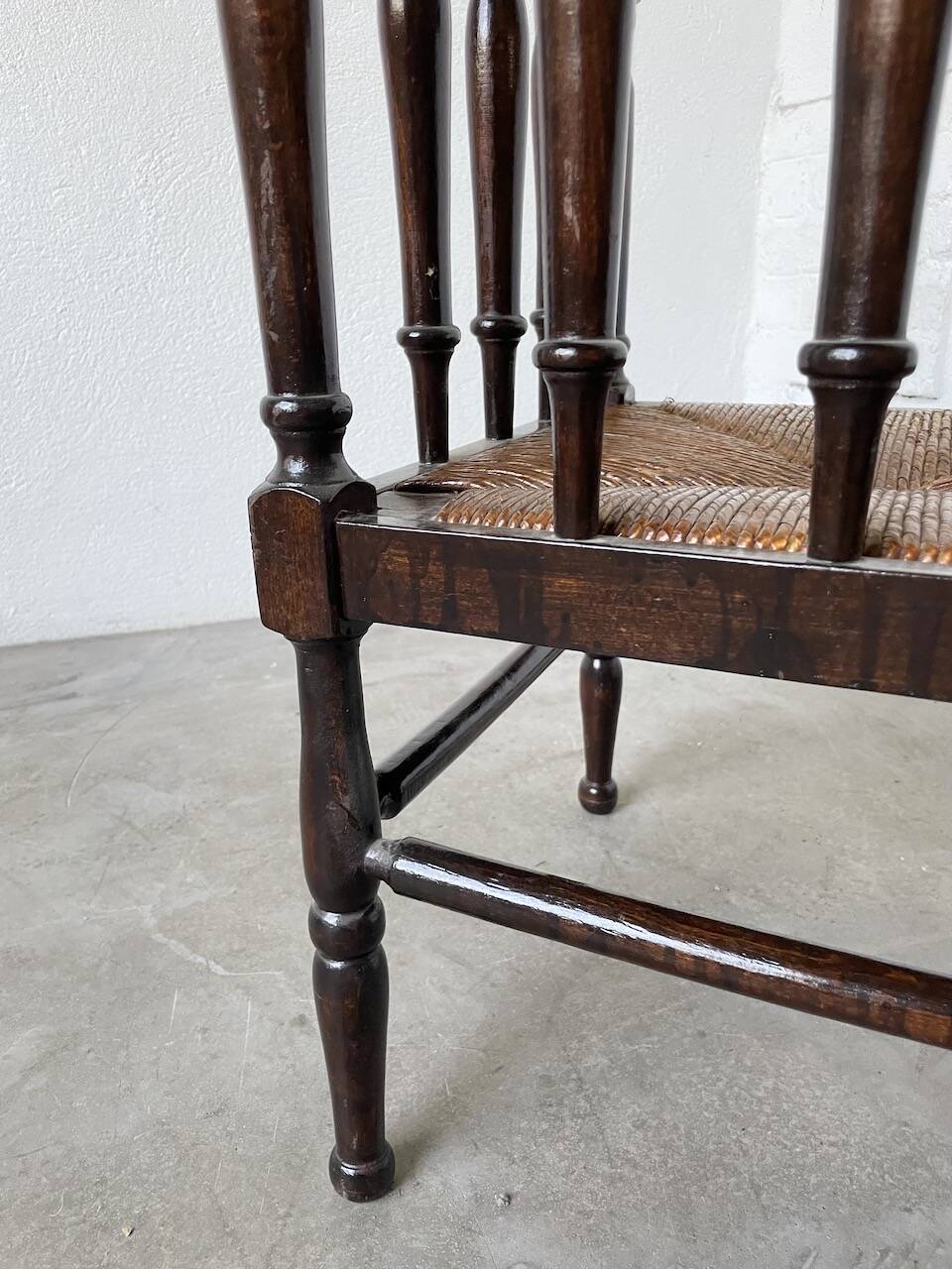 Straw chair by the fireside 1900