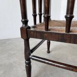 Straw chair by the fireside 1900