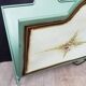 Vintage magazine rack in painted sheet metal