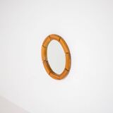 Sculptural wall-mirror in solid pine
