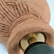 Anthropomorphic lamp foot depicting two faces terracotta design 80s