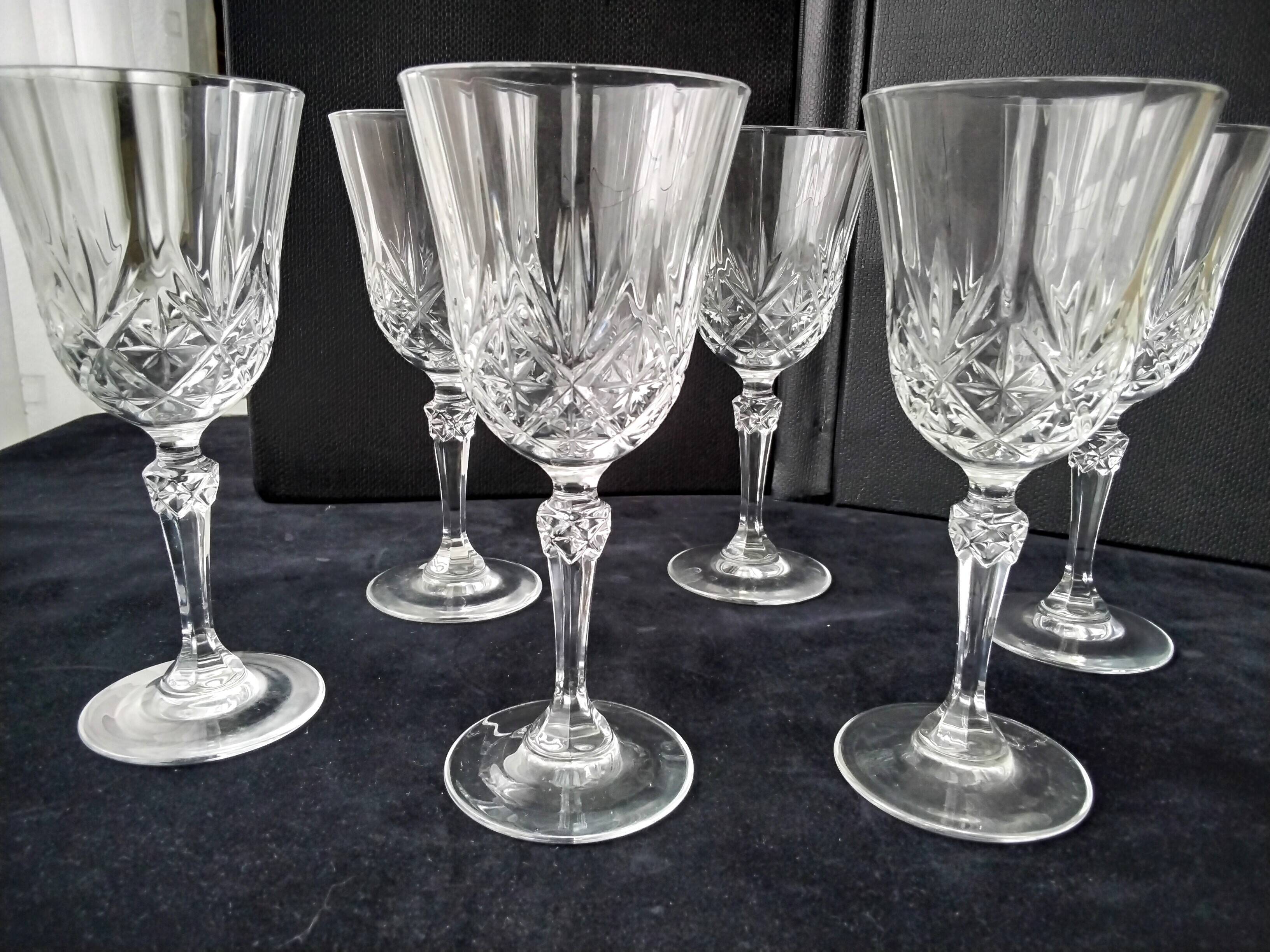 6 RCR crystal wine glasses