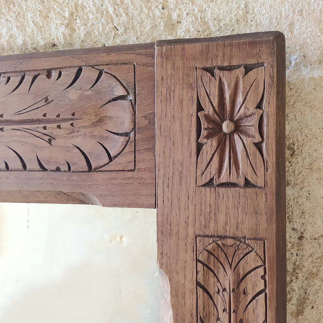 Carved wooden mirror