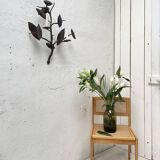 Wall lamp in wrought iron.