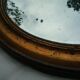 Miroir ovale ancien cadre en bois doré 45x35cm