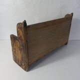 carved wooden shelf