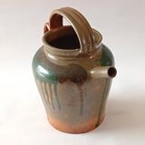 Glazed stoneware jug with drips