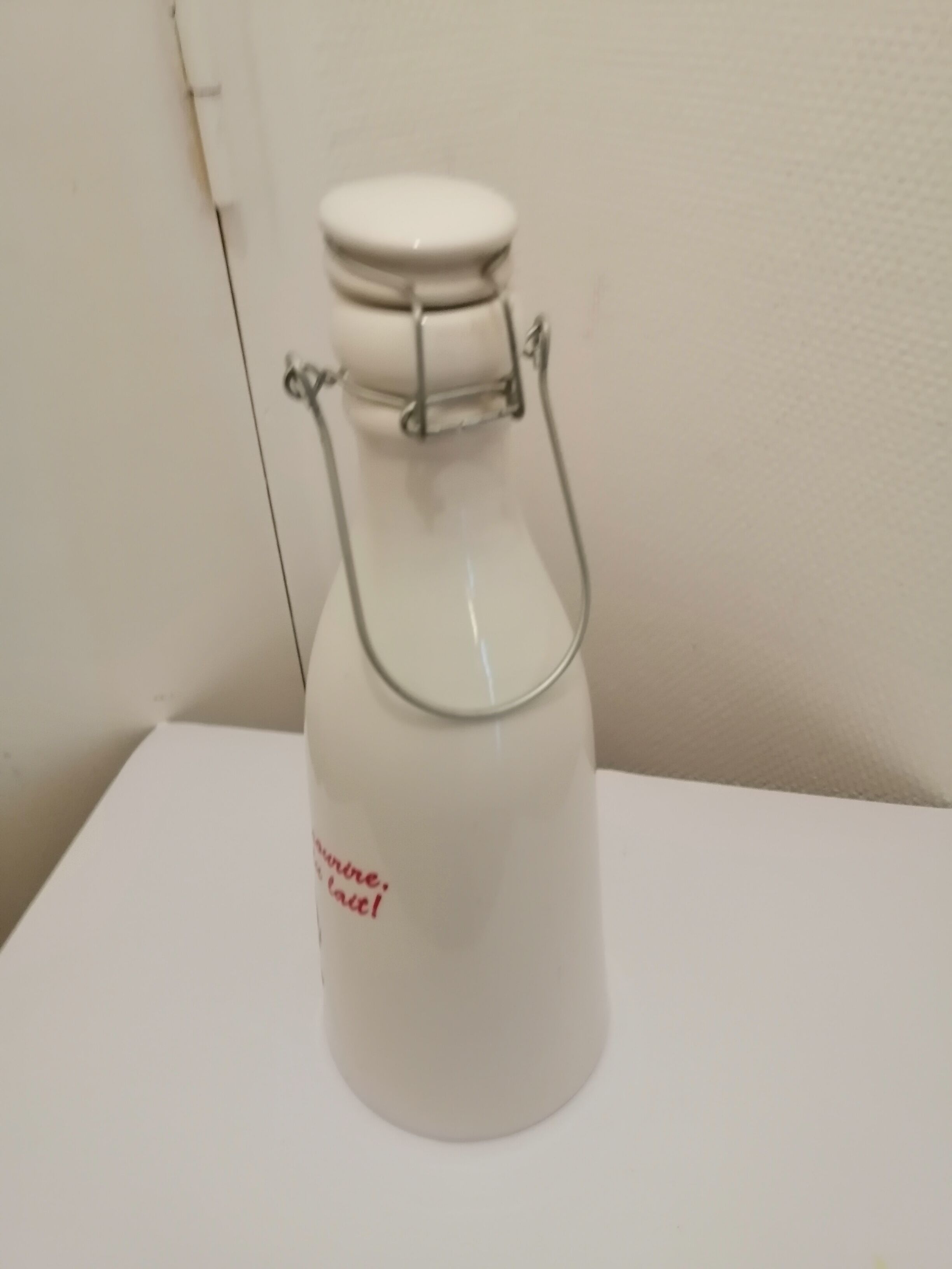 Vintage ceramic milk bottle