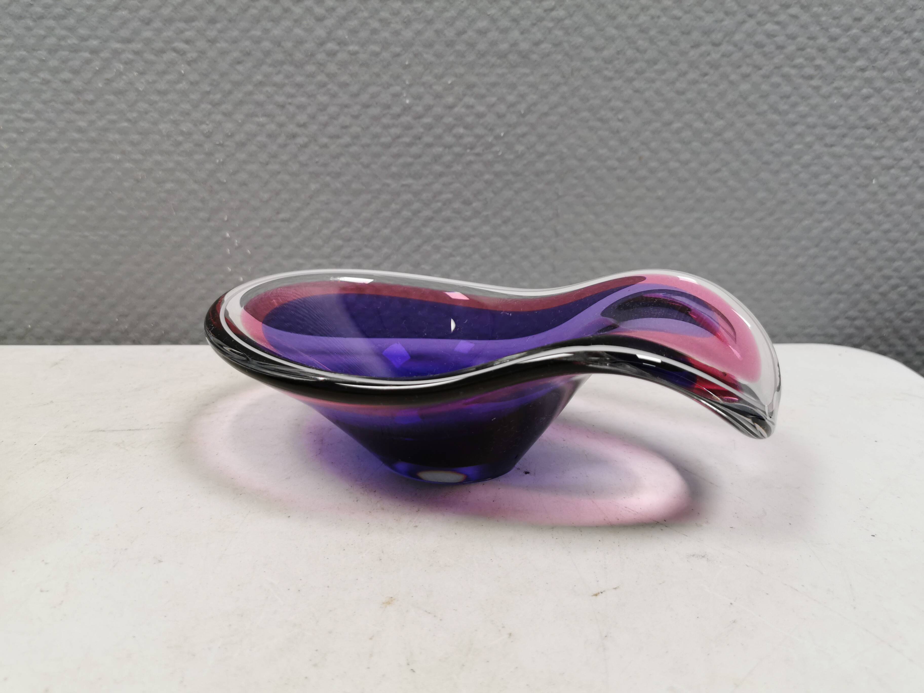 Beautiful dish/bowl in many coloured glass.