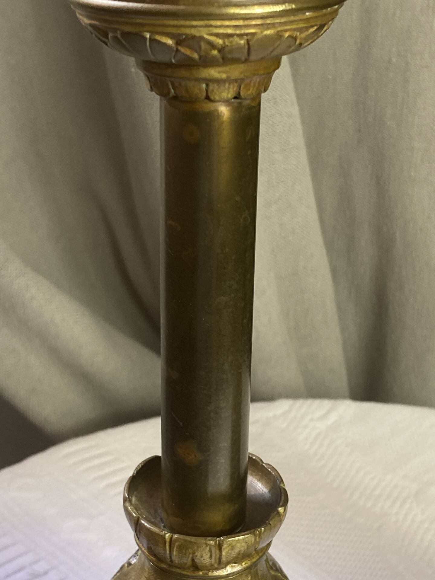 Pair of candlesticks in bronze and brass