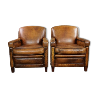 Set of two sheepskin leather armchairs