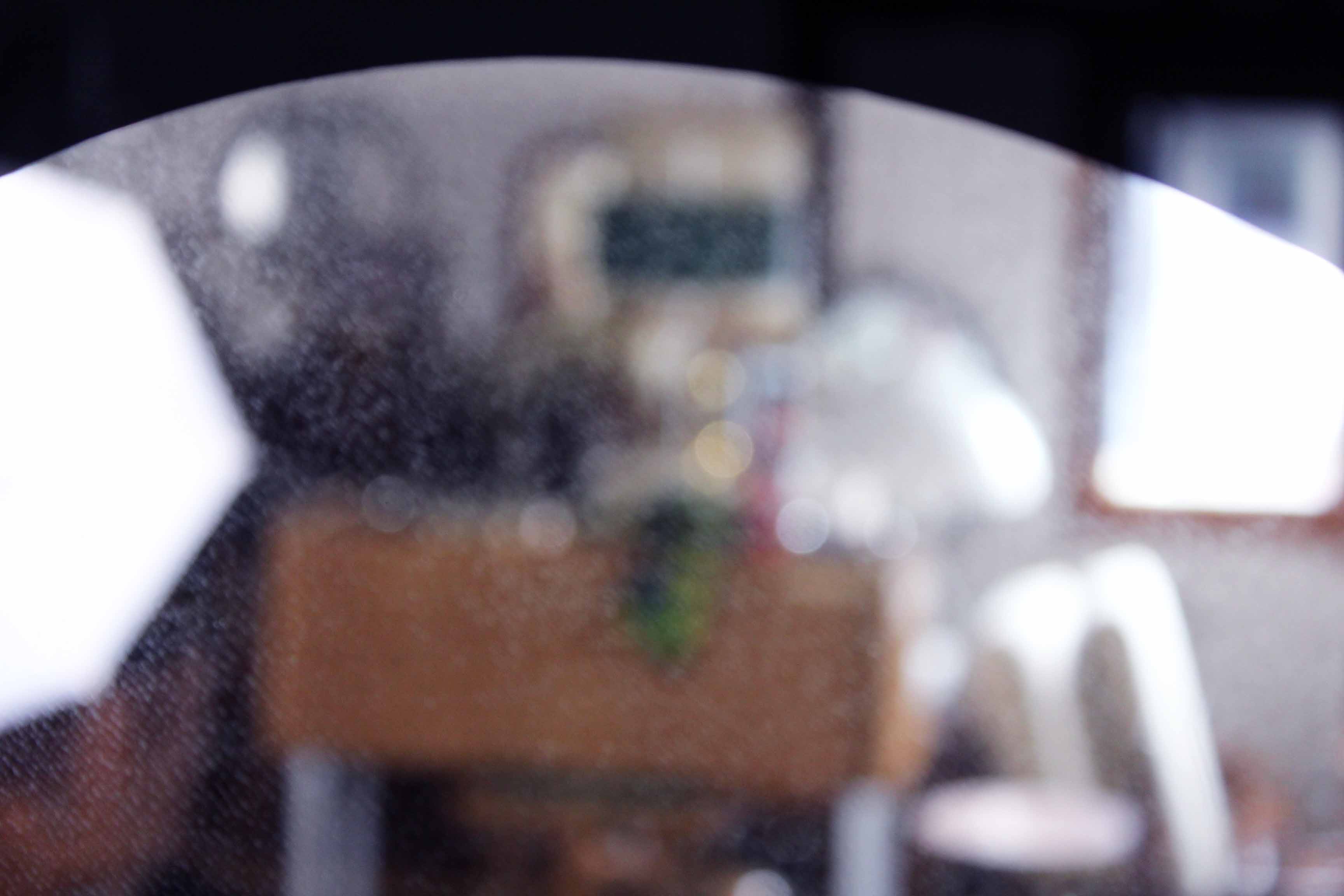 Black and gold 60s round mirror