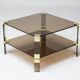 Hollywood Regency coffee table in smoked glass – Modular brass construction