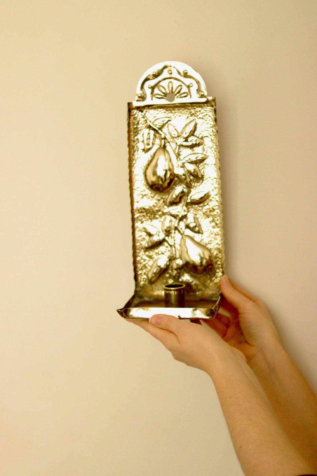 Vintage European brass sconce in pear motif